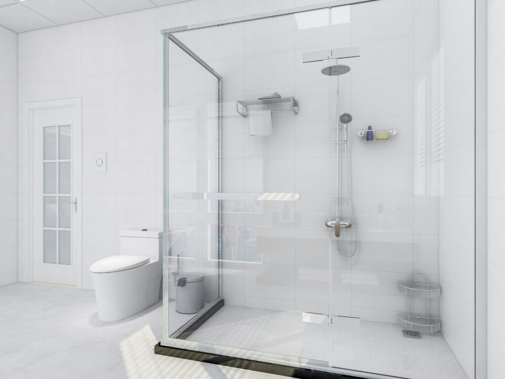 Modern bathroom featuring a glass shower enclosure, a sleek toilet, and light-colored tile walls. Ideal for a contemporary design inspiration.